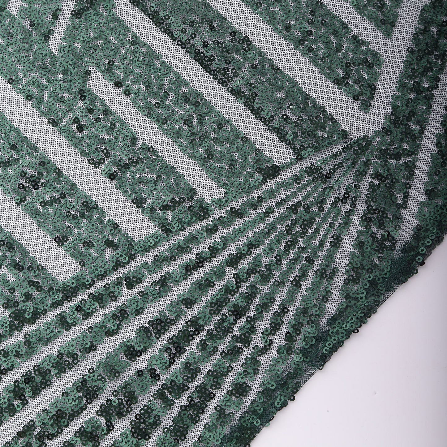 Emerald green geometric diamond glitz sequin napkins.