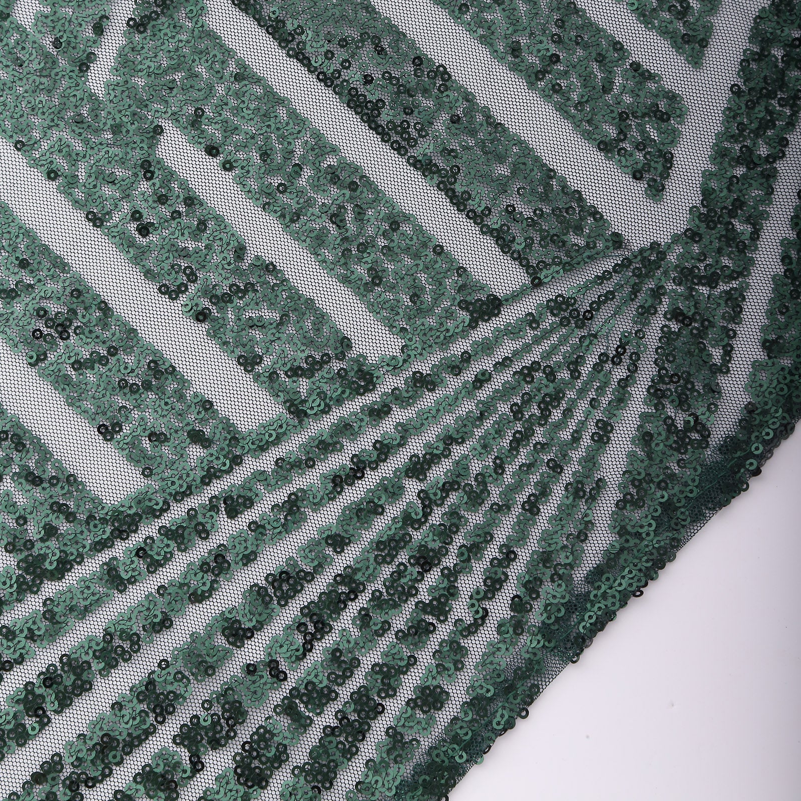 Emerald green geometric diamond glitz sequin napkins.