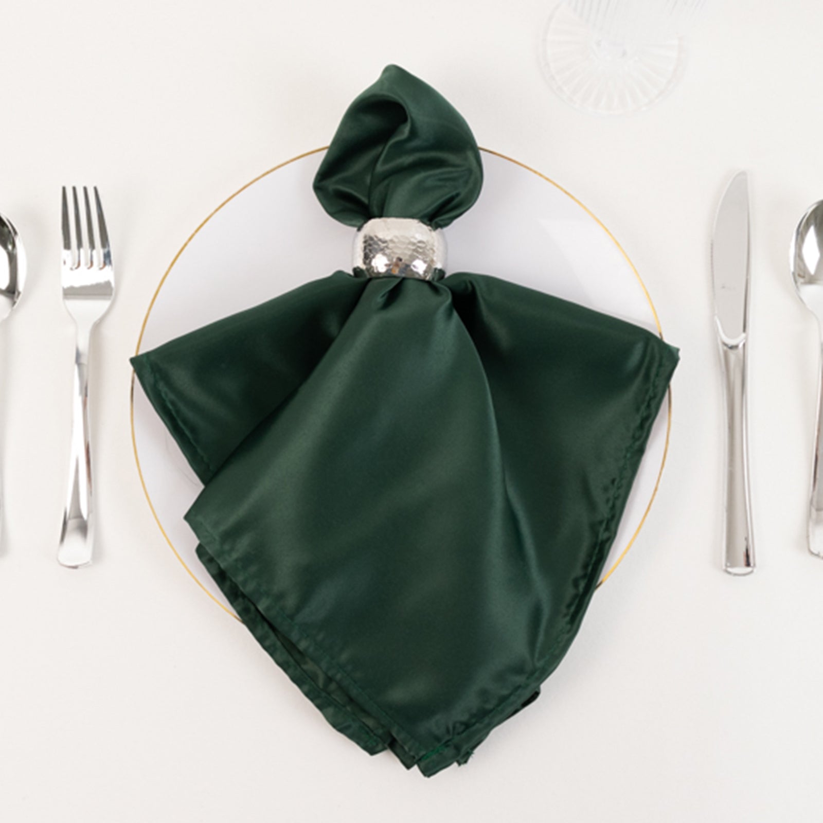 Hunter Emerald Green satin napkin elegantly styled on a table setting.