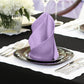 Lavender lilac satin napkins elegantly displayed on a table setting.