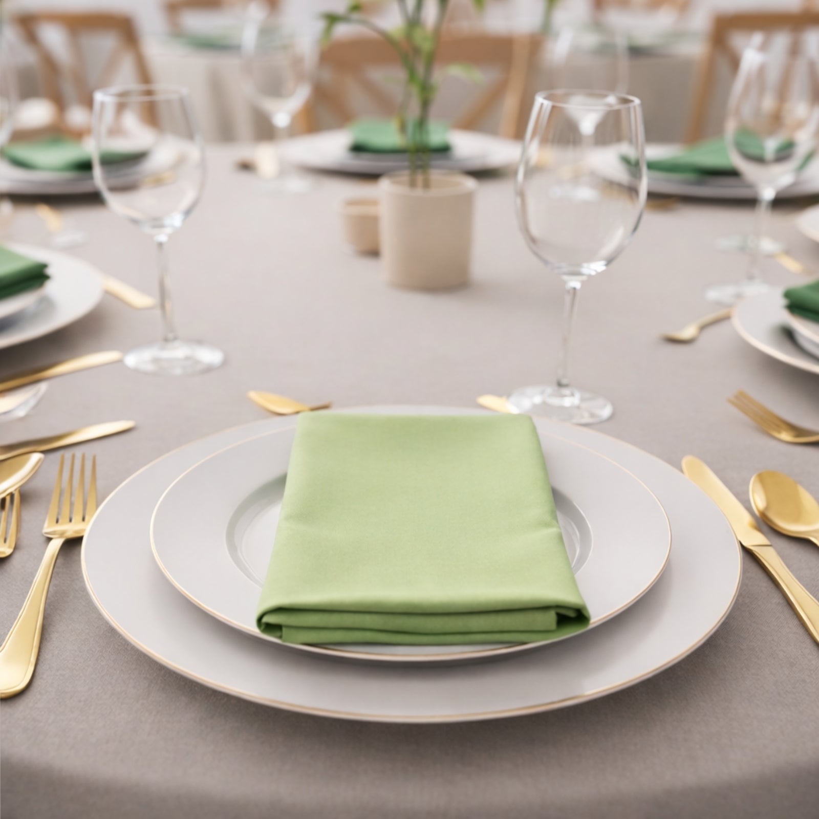5 Pack Sage Green Scuba Napkins on a dining table setting.