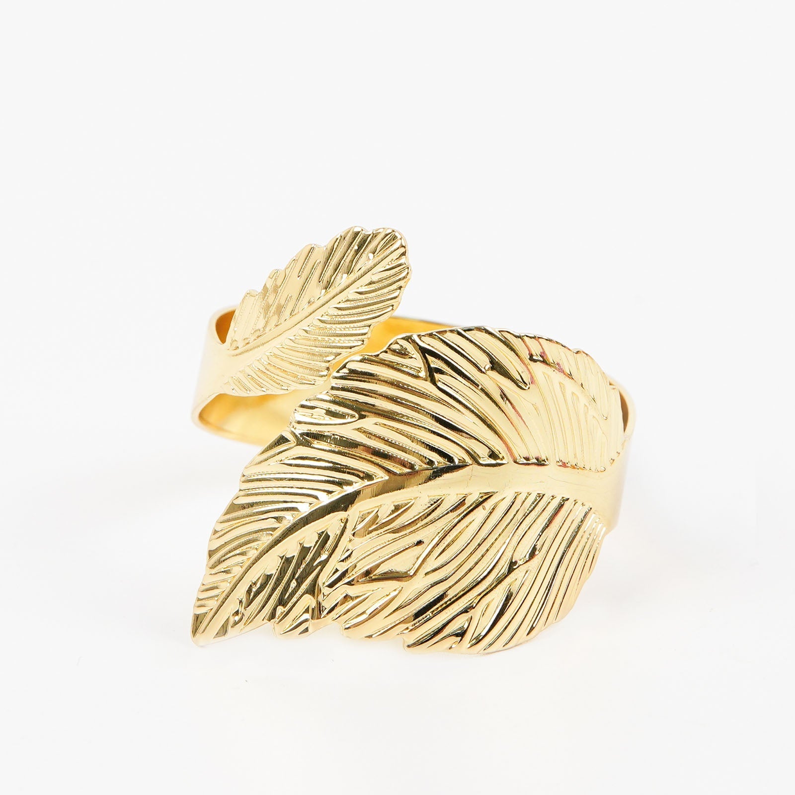 Metallic gold ornate leaf napkin ring holder.