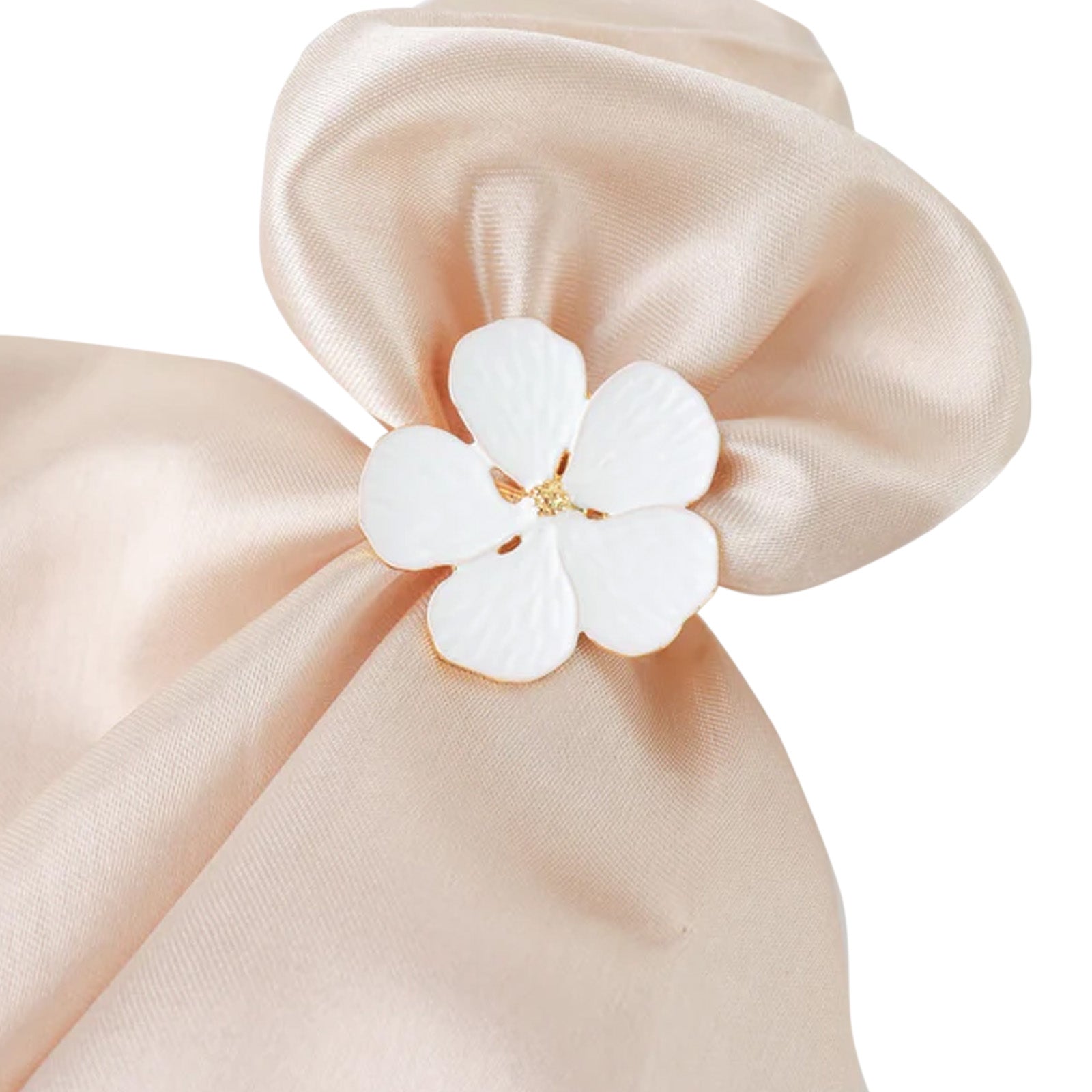 White and gold metal flower napkin ring with plum blossom design.