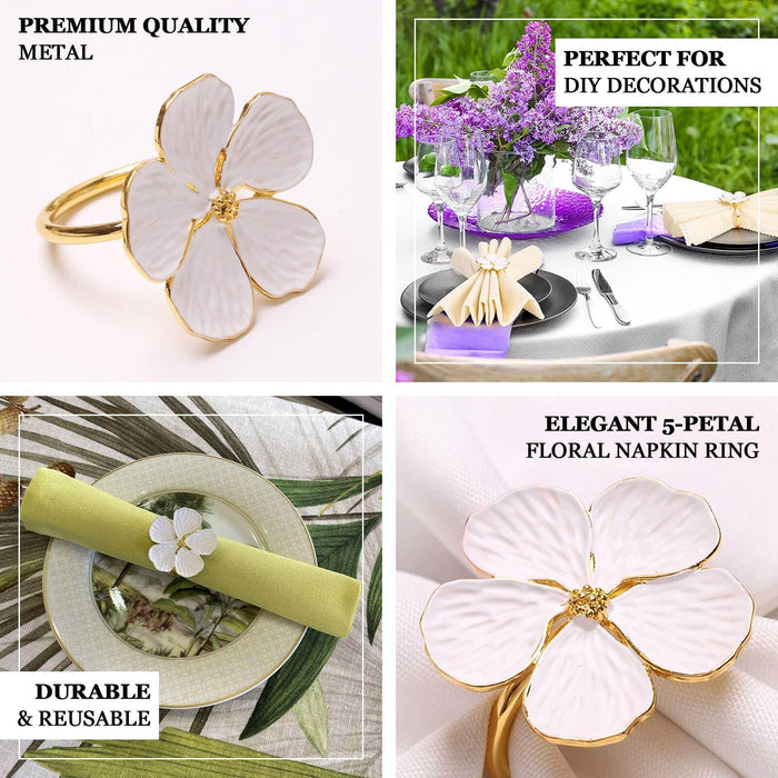 White and gold metal flower napkin rings with a plum blossom design.