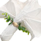 Rustic green eucalyptus leaf wooden beaded jute napkin rings.