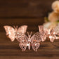 Rose gold butterfly napkin rings, decorative laser cut cloth holders.