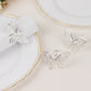 Silver butterfly napkin rings, decorative laser cut holders for elegant table settings.