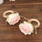 Blush artificial rose wooden napkin holders for farmhouse decor.