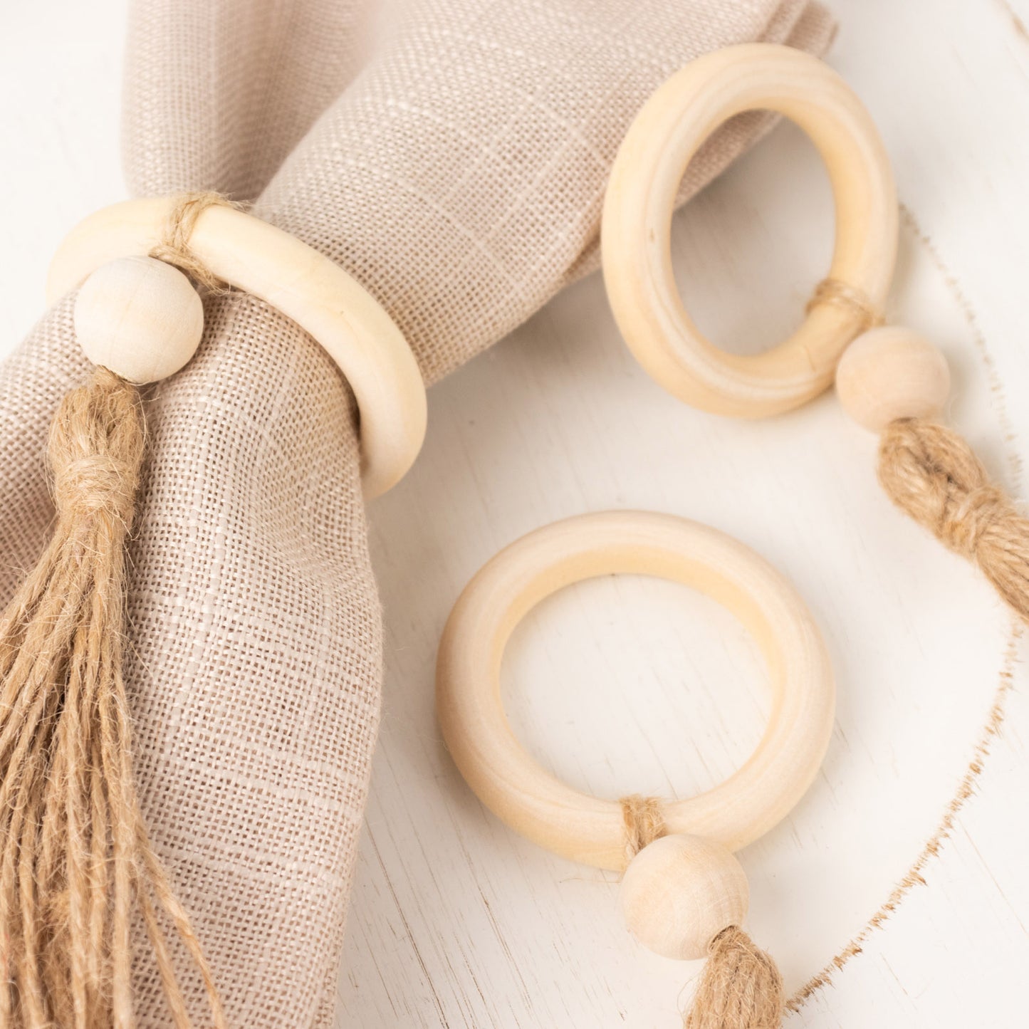 4 Pack Cream Wooden Napkin Rings with Woven Jute Beaded Tassel, Rustic Boho Chic Serviette Buckles