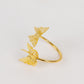 Gold butterfly metal napkin holder for dining table decor.