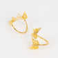 Gold laser cut butterfly napkin holders for dining table decor.