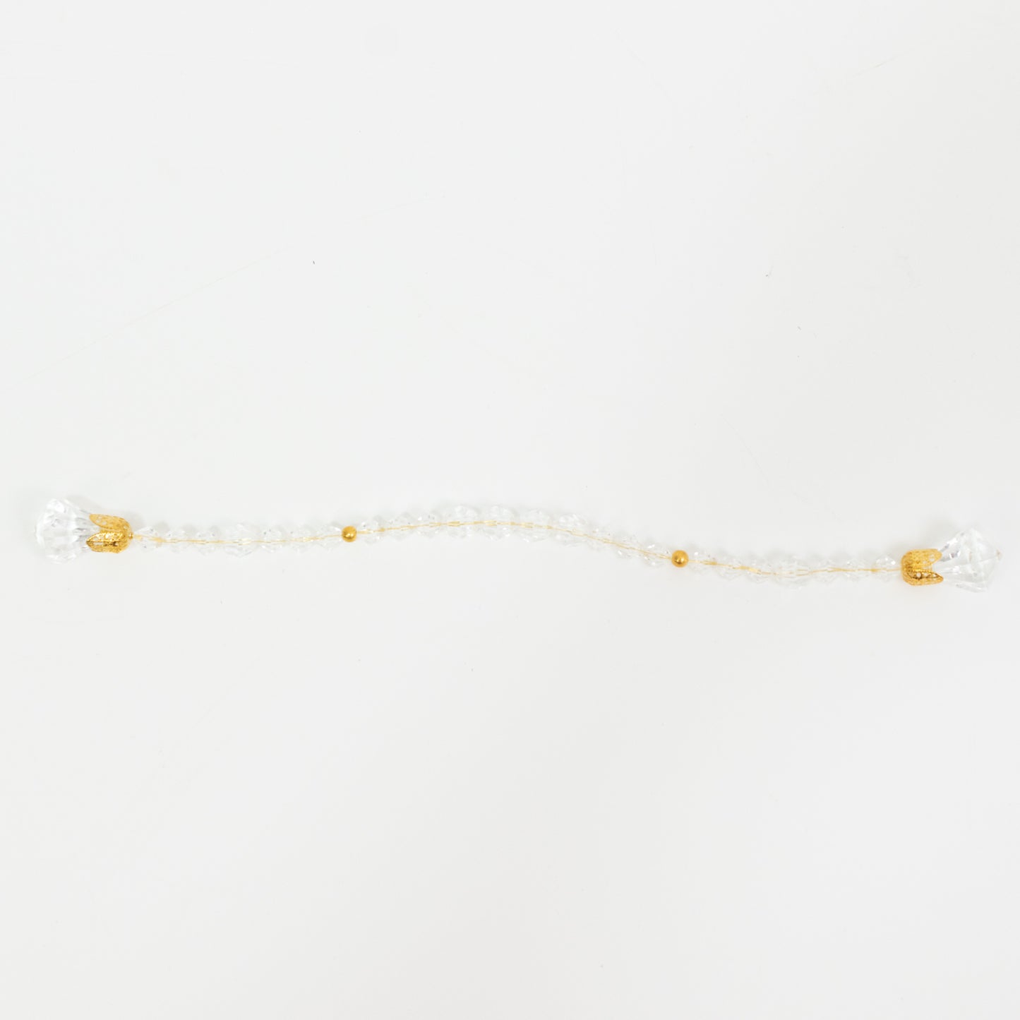 Clear crystal beaded napkin ring with gold accents