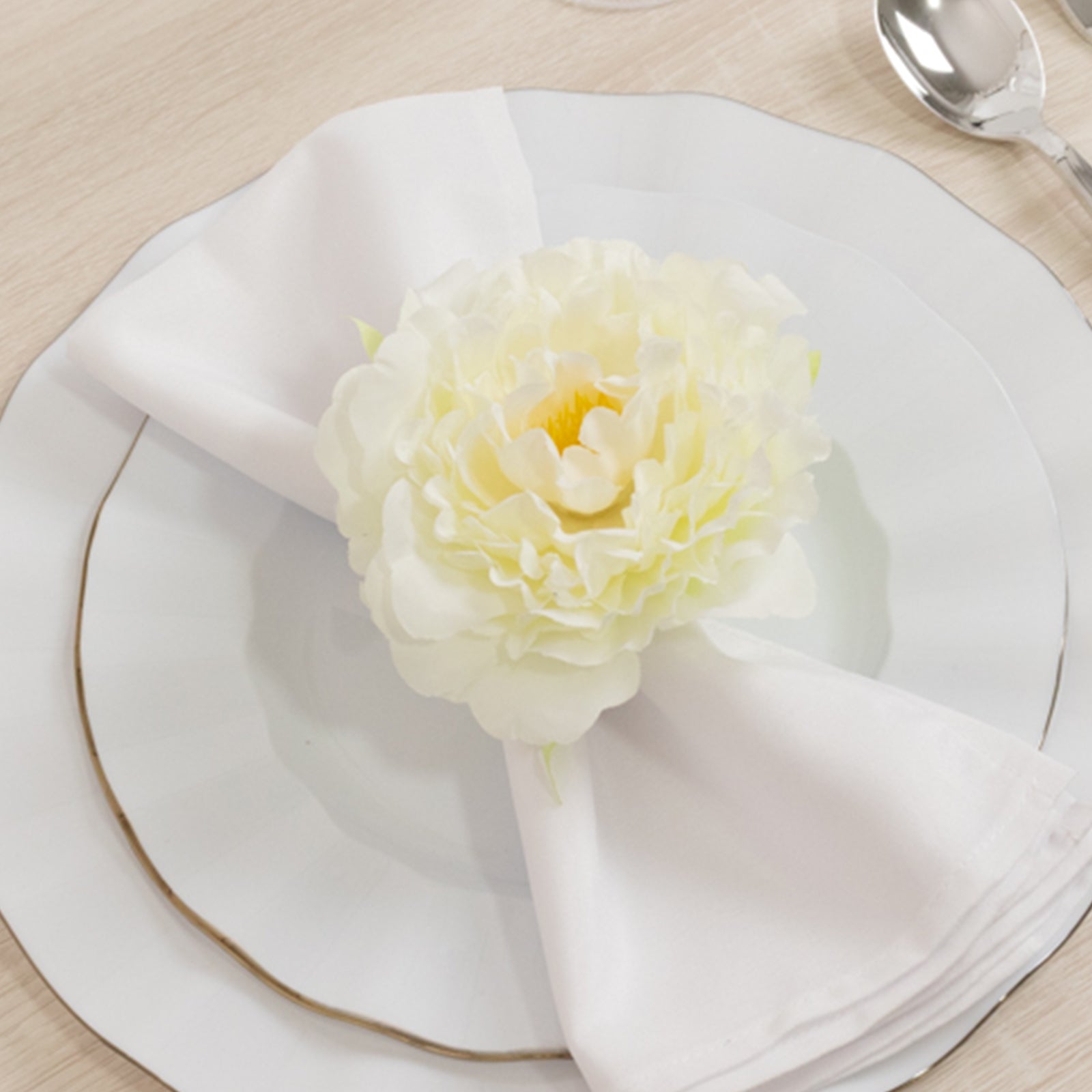 Ivory floral napkin holder with silk peony flower for dining table settings.