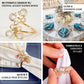 Gold butterfly napkin holder with crystal accents on elegant table setting.