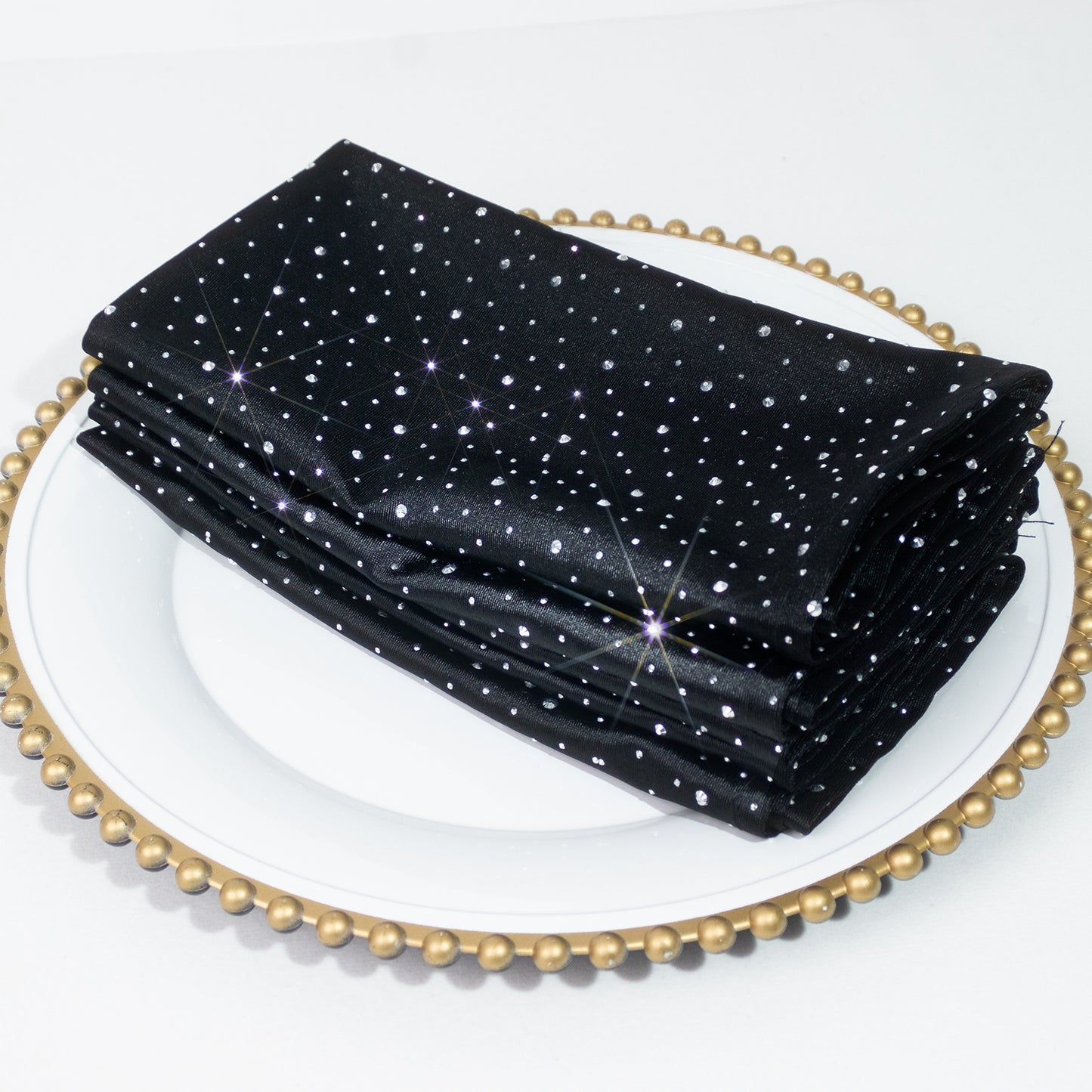 Black scuba polyester napkins with rhinestone accents, 20"x20", wrinkle-free.