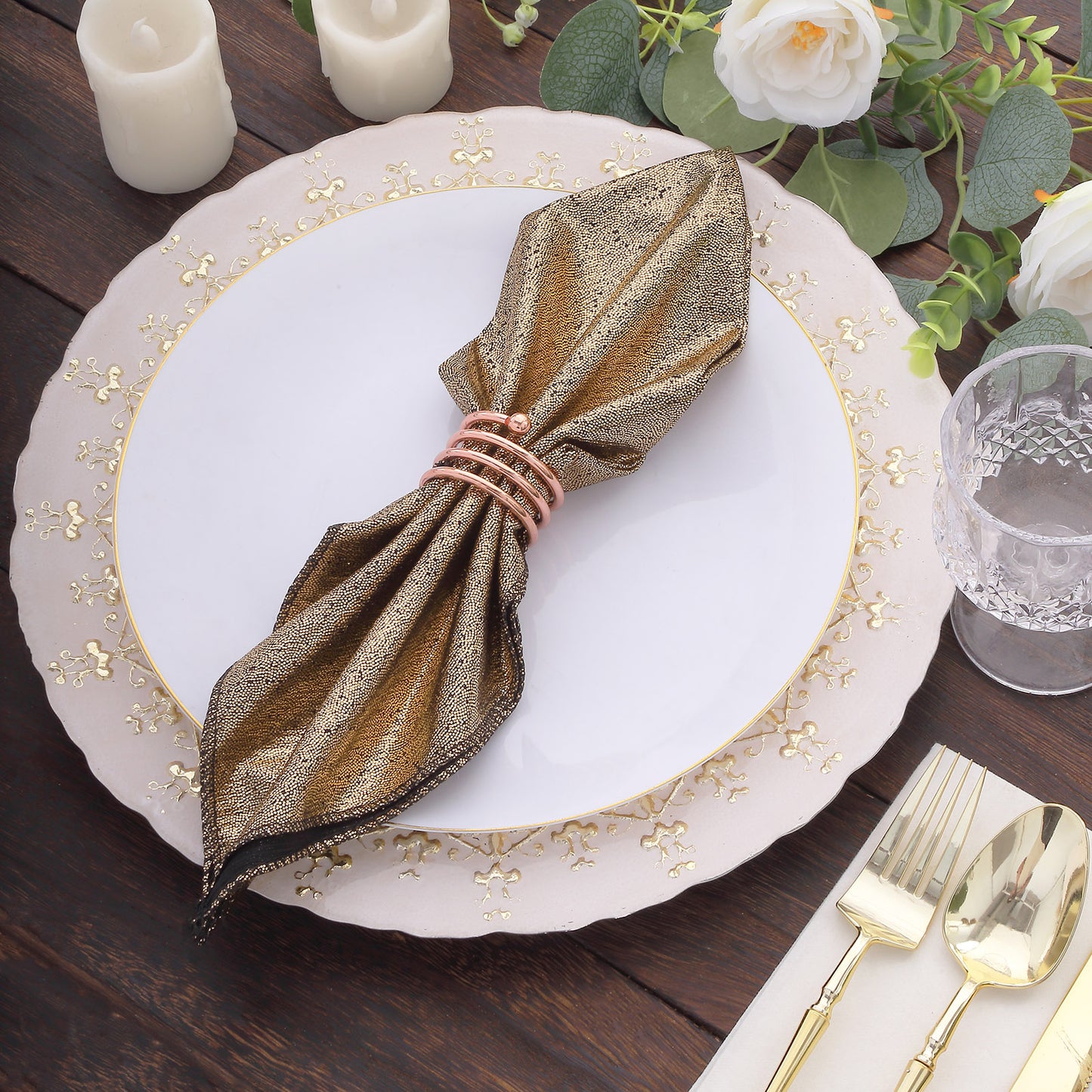 Antique gold shimmer sequin dot napkin on elegant table setting.