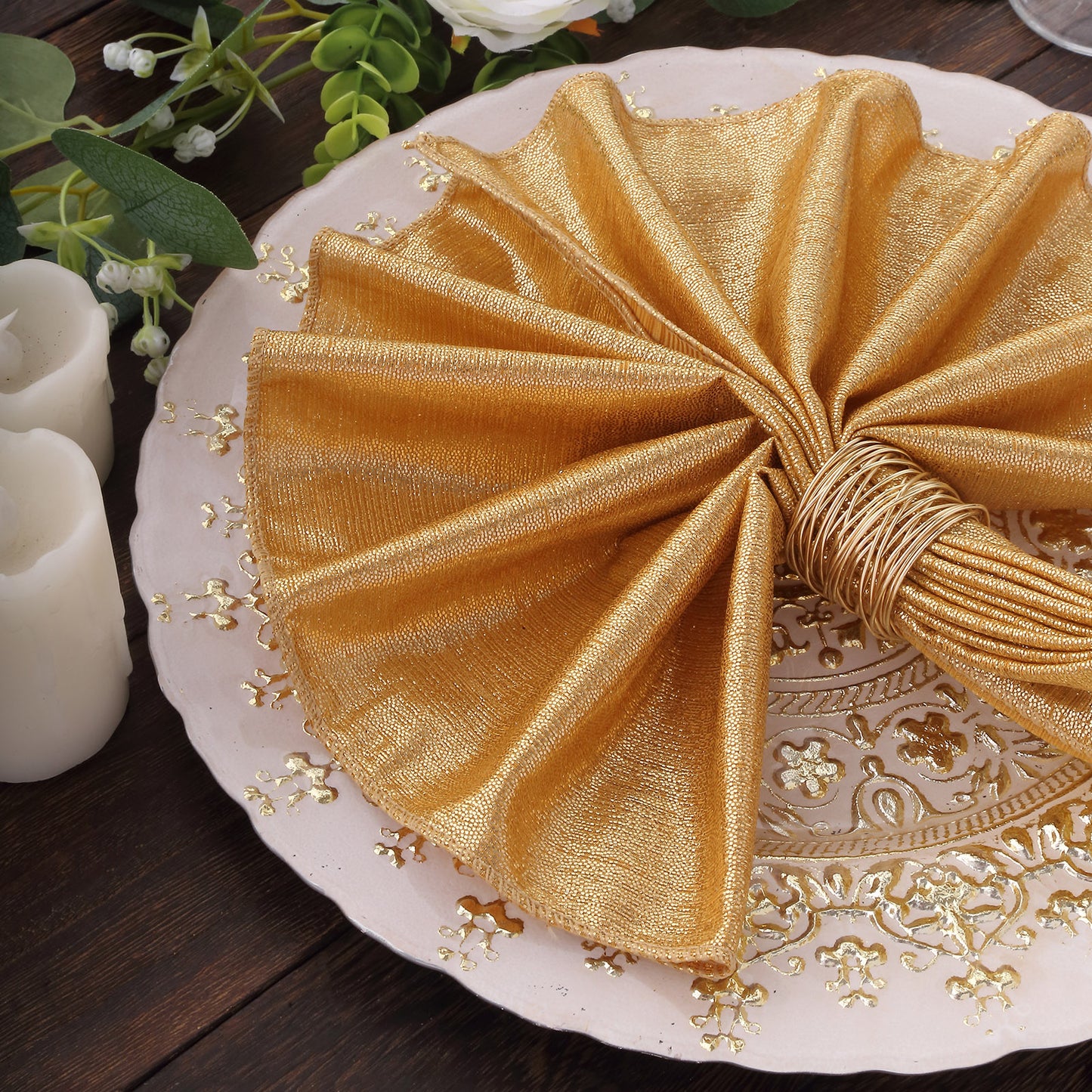 Gold shimmer sequin napkin on an elegant plate, perfect for dinner settings.