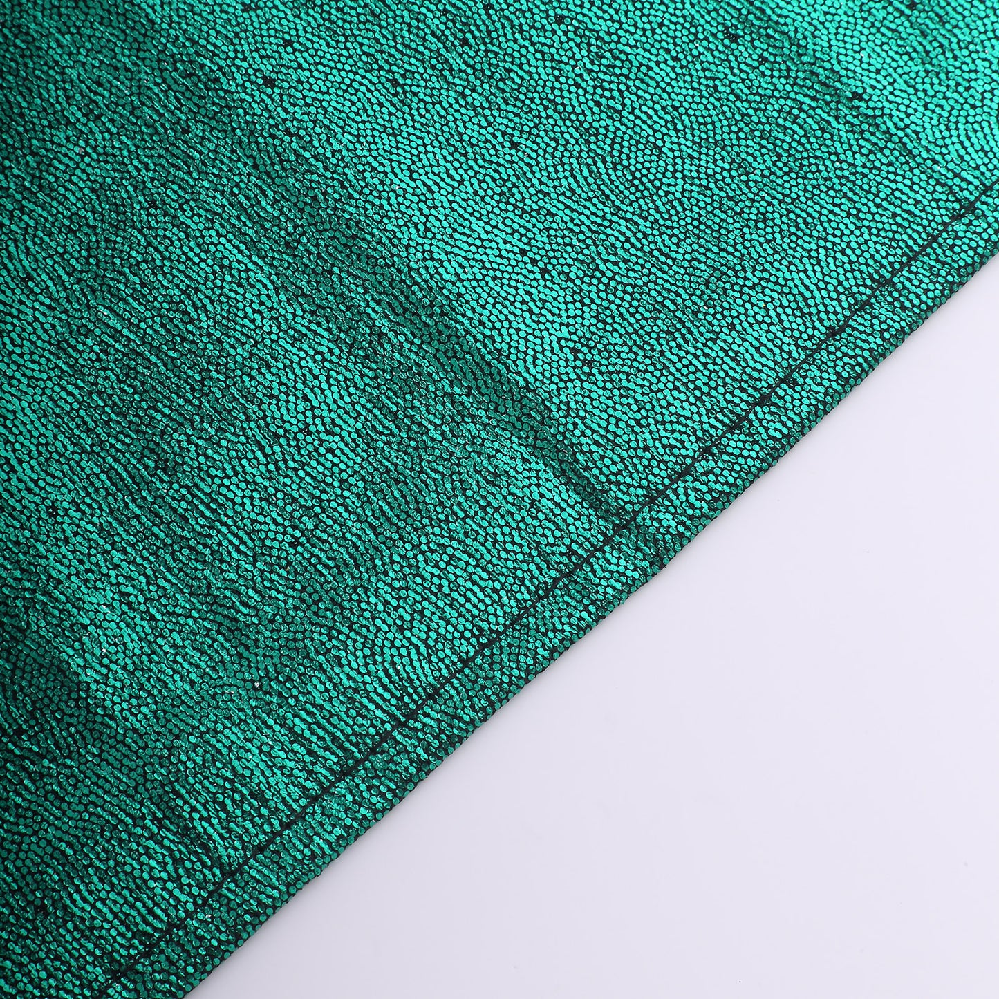 Emerald green shimmer sequin table napkin, reusable and stylish.