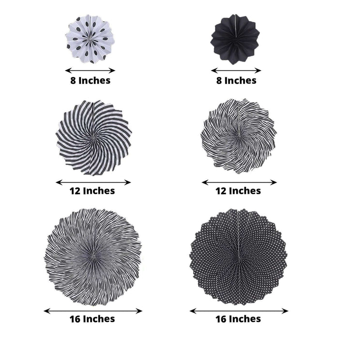 Set of 6 black and white hanging paper fan decorations, 8"-16" sizes.