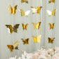 Gold 3D paper butterfly garland streamers for party decoration.