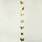 Gold 3D paper butterfly garland streamers hanging decor.