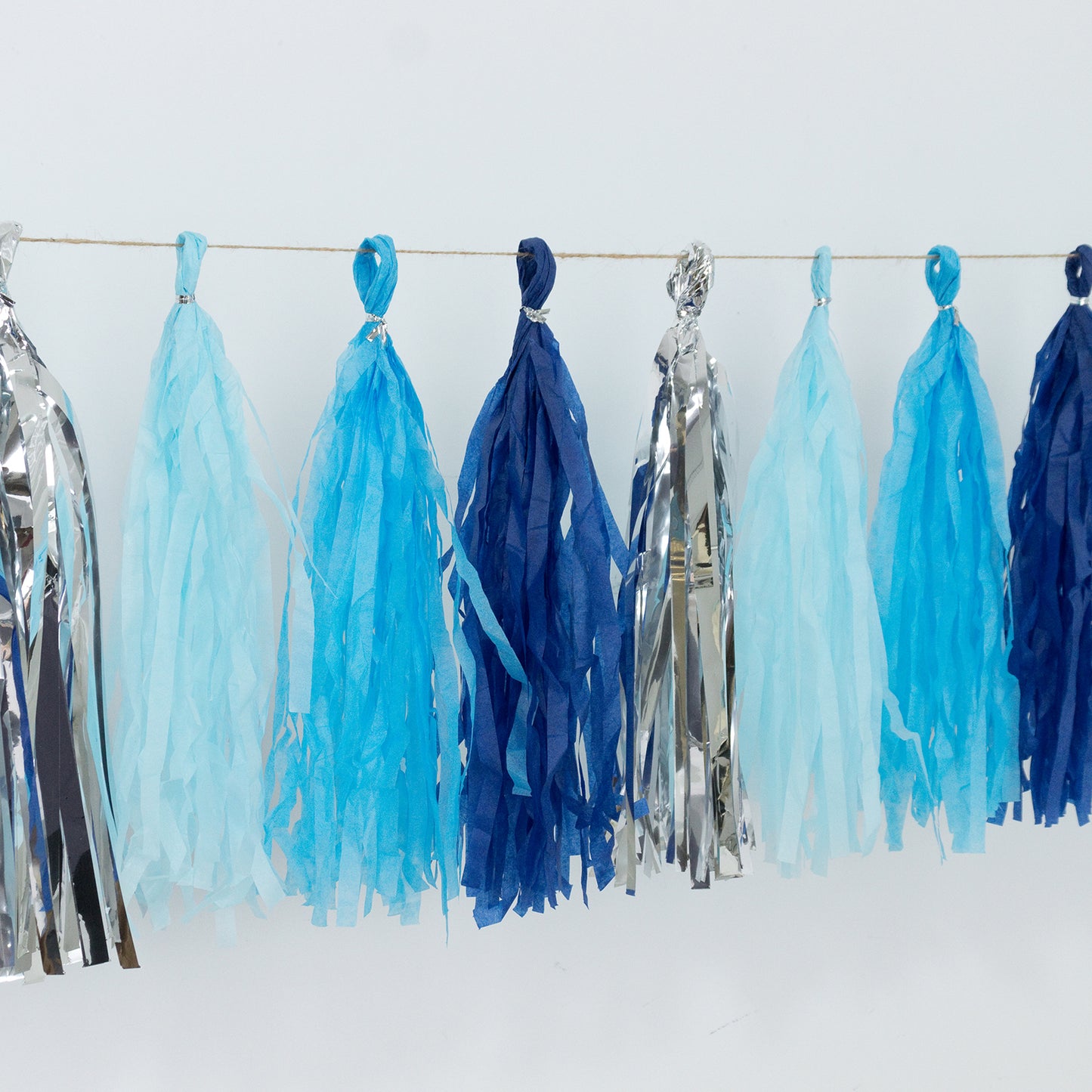 Blue and silver pre-tied foil tassel garland banner decoration.