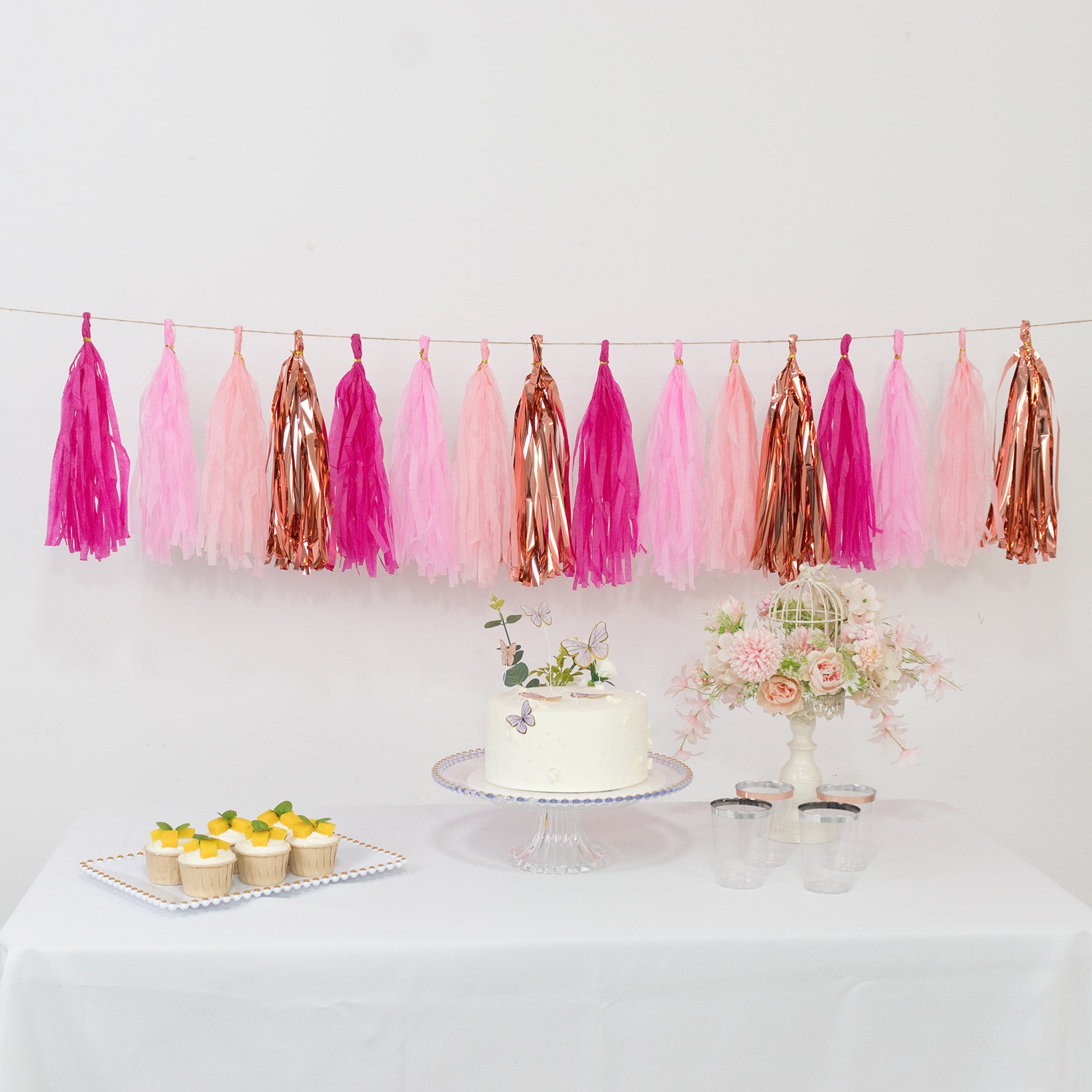 Pink and rose gold tassel garland banner decoration.