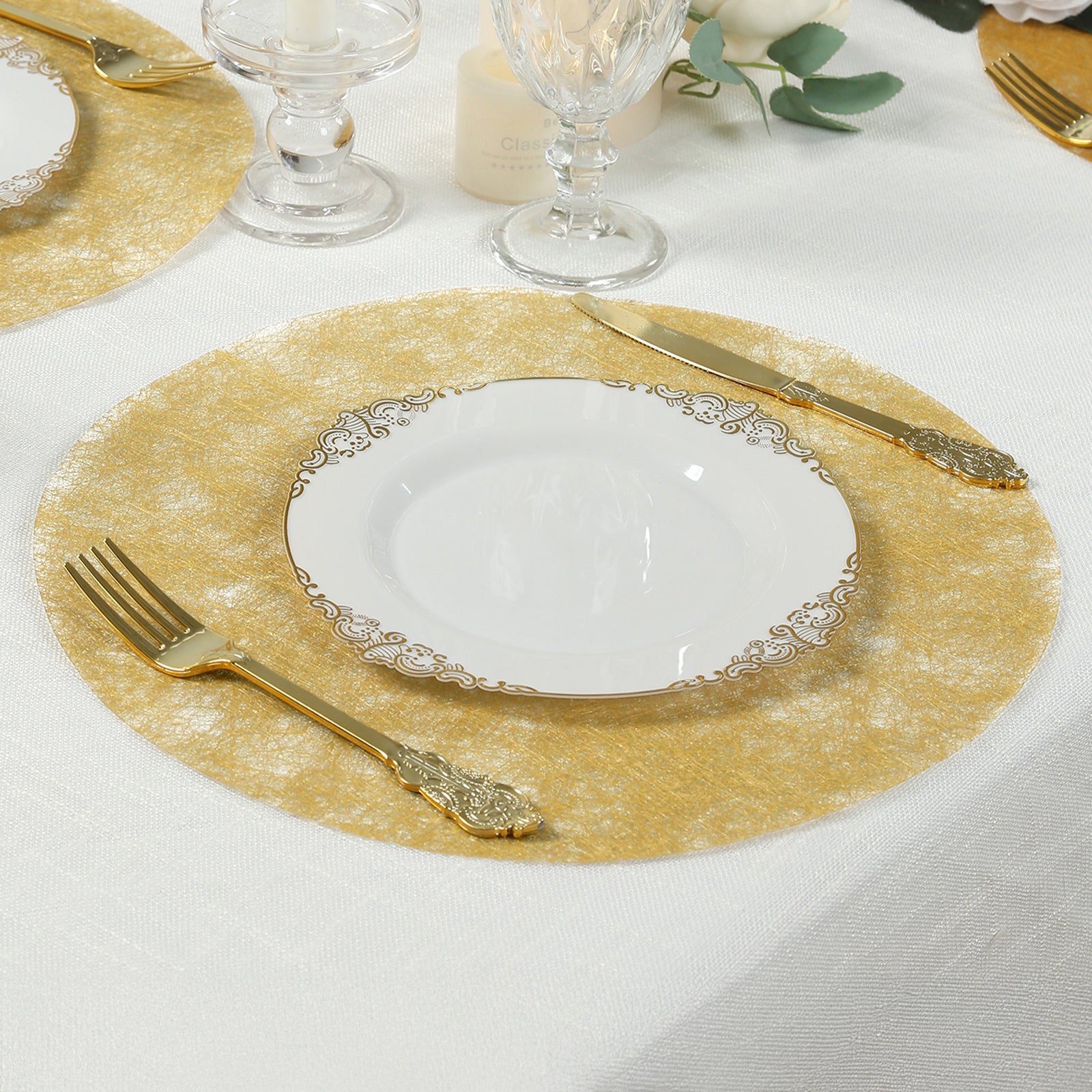 Disposable metallic gold placemat on a dining table setting.
