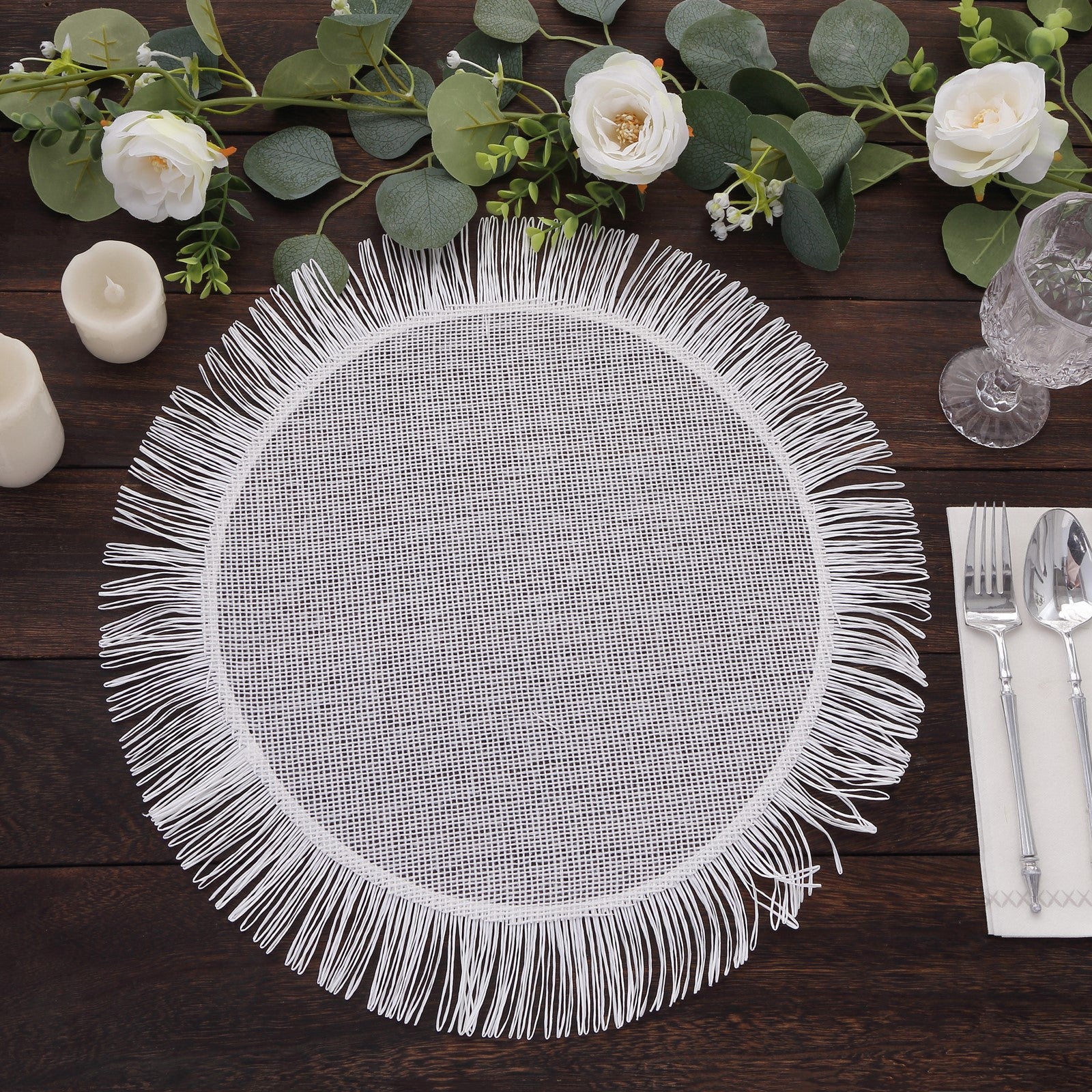 White rustic burlap round table mat with fringe edges.