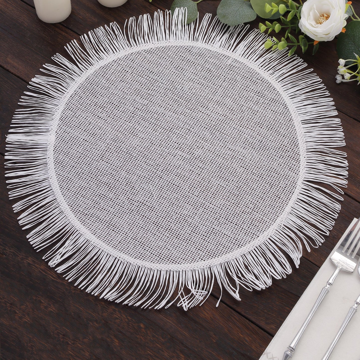 White rustic burlap tassel round table mat with fringe edge.