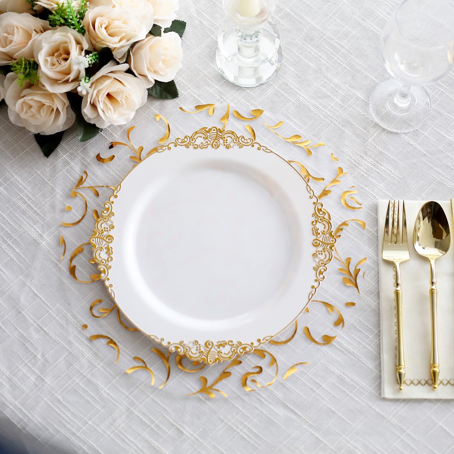 Metallic gold sheer organza table mats with embossed foil flower design.
