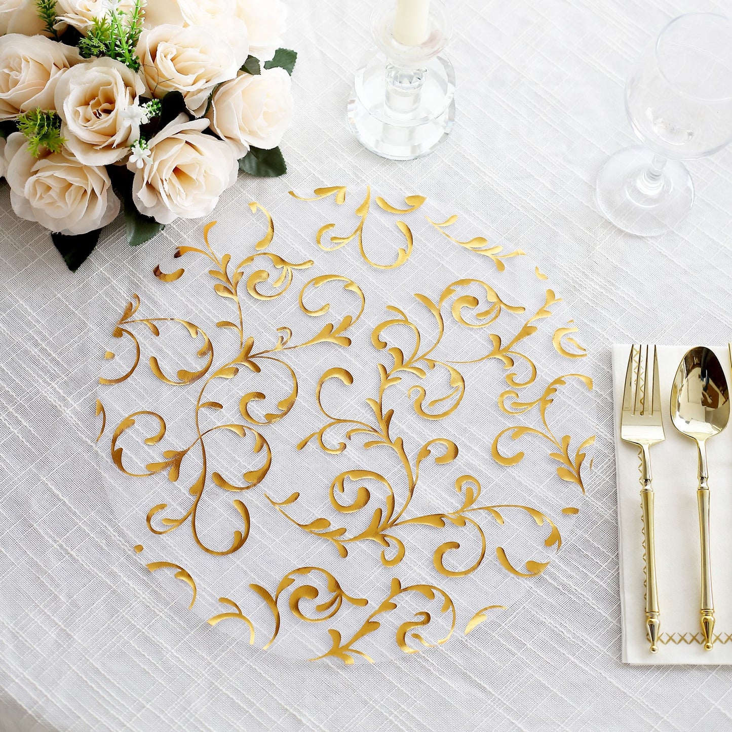 Metallic gold sheer organza placemat with embossed flower design.