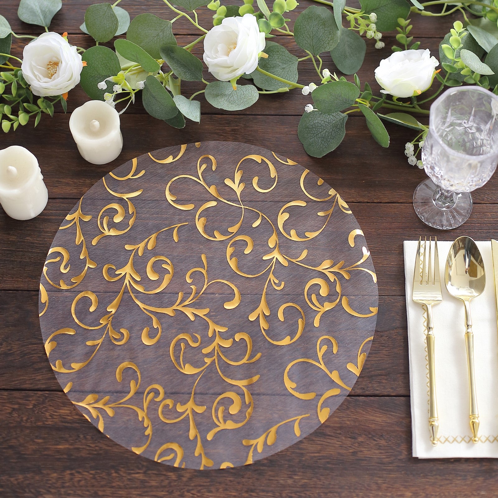 Metallic gold sheer organza placemat with embossed floral design.