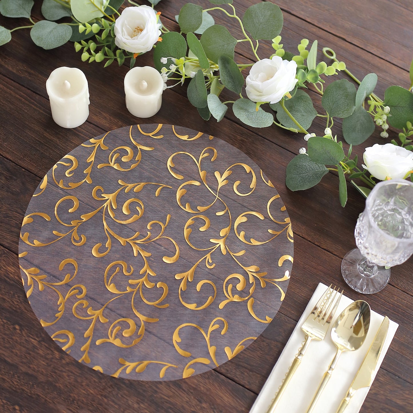 Metallic gold sheer organza dining table mat with embossed foil flower design.
