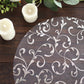 Metallic silver sheer organza dining table mat with embossed foil flower design.