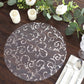 Metallic silver sheer organza placemat with embossed floral design.