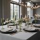 Dusty sage green fluted disposable champagne flutes on a table setting.