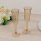 Transparent amber gold fluted plastic champagne flutes.