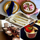 Metallic gold heavy duty plastic spoons, perfect for elegant dining.