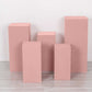 Dusty rose spandex pedestal stand covers in a set of five.