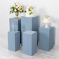 Dusty blue spandex pedestal stand covers for decorative displays.