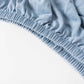 Dusty blue spandex pedestal stand cover with stretchable design.