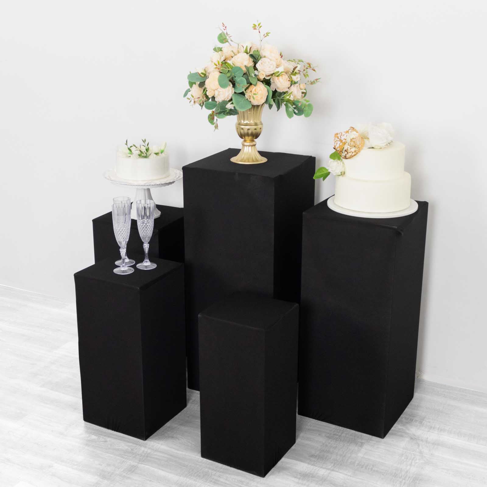 Black spandex pedestal stand cover for rectangle props, size XL.