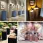Beige spandex pedestal stand covers for events and displays.
