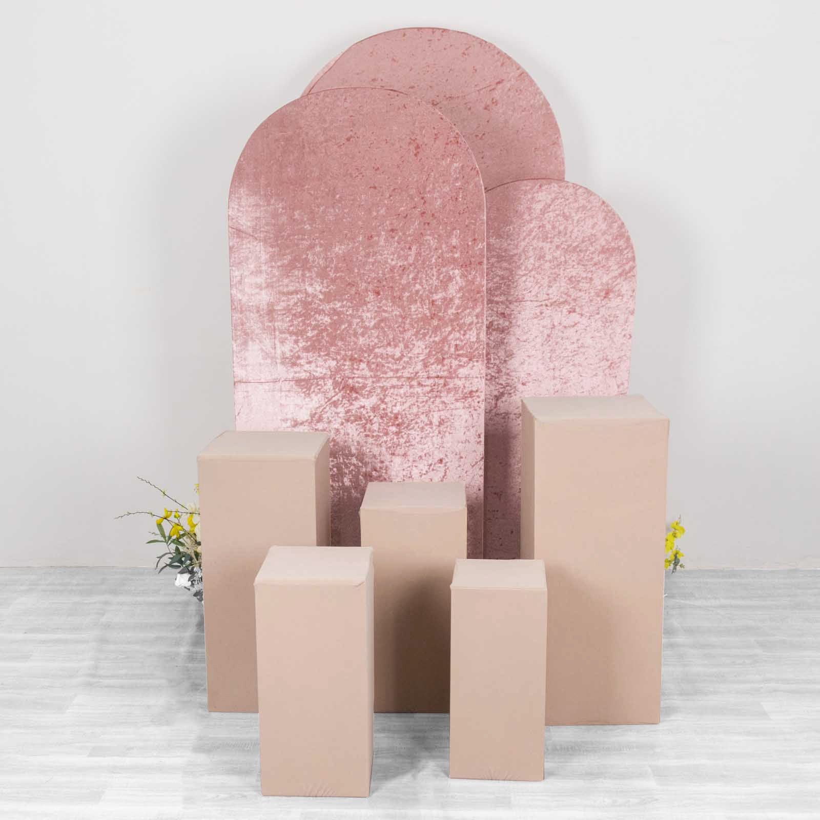 Nude spandex pedestal stand covers on display with pink backdrop.
