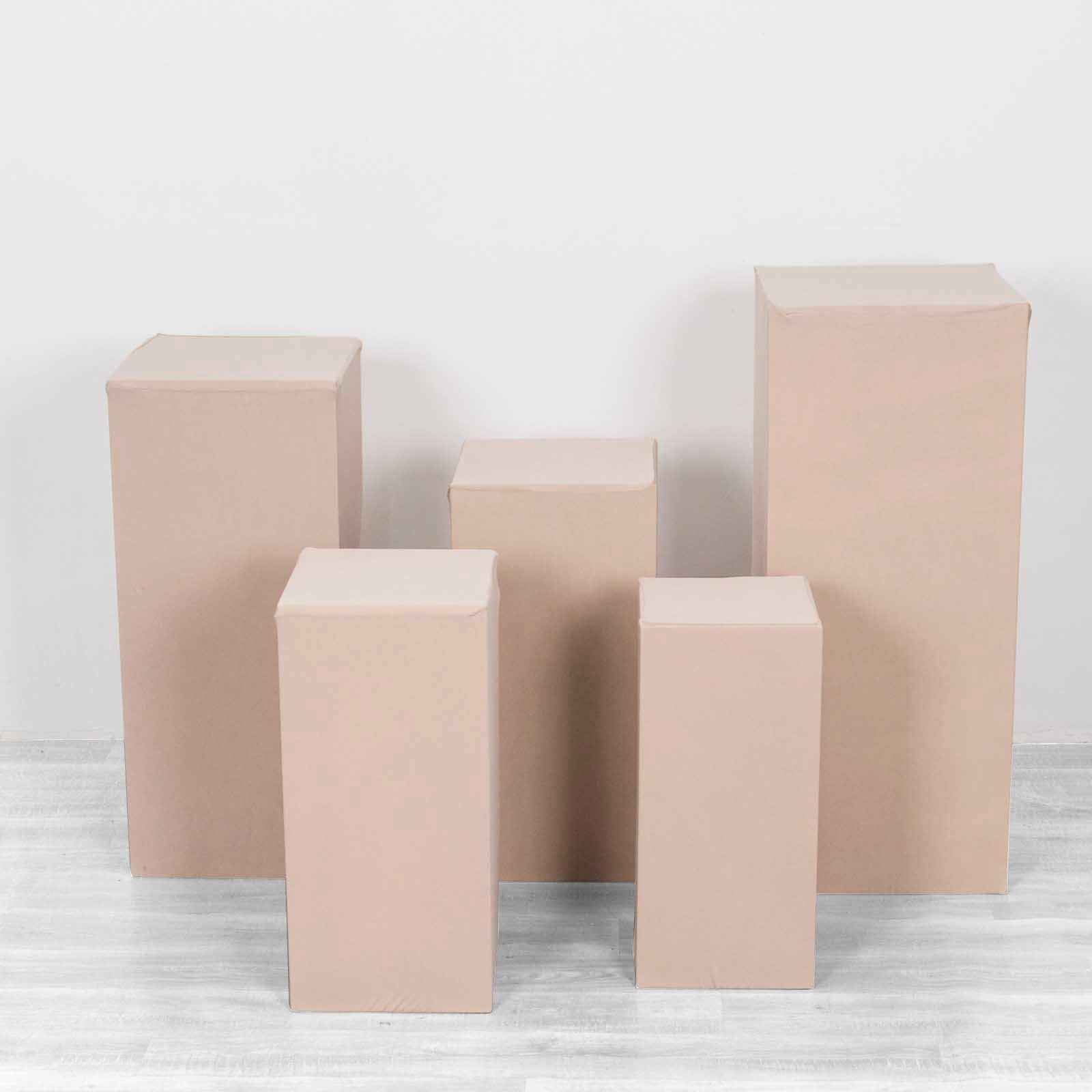 Nude spandex pedestal stand covers in a set of five, stretchable and versatile.