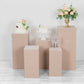 Nude spandex pedestal stand covers for events and displays.