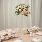 Clear acrylic flower pedestal stand with hanging crystal beads and floral arrangement.