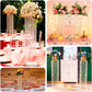 Clear acrylic flower pedestal stand with hanging crystal beads for weddings.