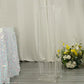 Clear acrylic flower pedestal stand with hanging crystal beads for wedding centerpieces.